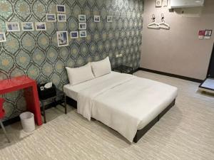 苓旅萬年-LIN INN Wan Nian客房内的一张或多张床位