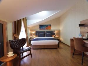 Jaff Hotels & Spa Nisantasi客房内的一张或多张床位