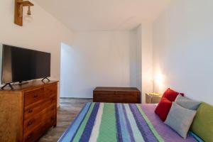 Casa di Noi客房内的一张或多张床位