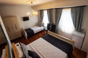 Ebruli Hotel客房内的一张或多张床位
