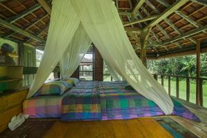 Tepi Sawah Lodge & Retreat客房内的一张或多张床位