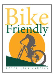 莱斯卡耐伽胡安酒店的自行车友好标志,骑车者