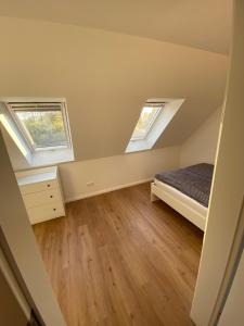 Haus Wesloer Landstraße 6b für 4 Personen客房内的一张或多张床位