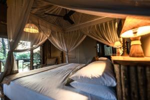 South Okavango - Omogolo Hideaways客房内的一张或多张床位