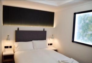 
伦敦维多利亚旅馆客房内的一张或多张床位
