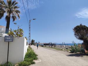 托雷德本纳贾尔邦Benatorre Playa (Casa en primera línea de playa).的相册照片