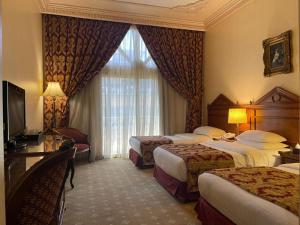 Serenada Golden Palace - Boutique Hotel客房内的一张或多张床位