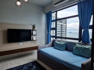 Nana Homestay - Jesselton quay客房内的一张或多张床位