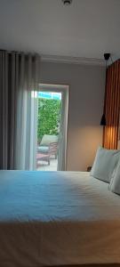 阿马多拉皇宫酒店客房内的一张或多张床位