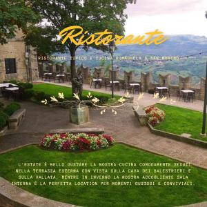 圣马力诺贝拉维斯塔酒店的一张带公园照片的餐厅的传单