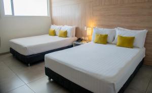 库库塔卡萨布兰卡酒店客房内的一张或多张床位