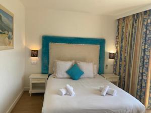 勒加比安酒店客房内的一张或多张床位