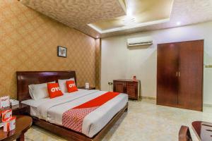 OYO 109 Al Thabit Modern Hotel Apartment客房内的一张或多张床位