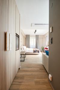The Mavili urban stay客房内的一张或多张床位