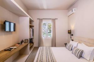 梅萨雷亚桉树酒店 的酒店客房,配有床和电视