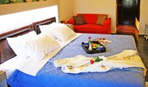 萨莫斯湾加戈海滩酒店客房内的一张或多张床位