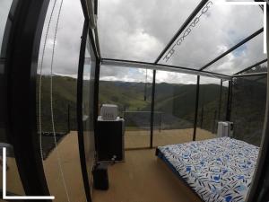 拉塔昆加Cotopaxglam的山景客房 - 带一张床