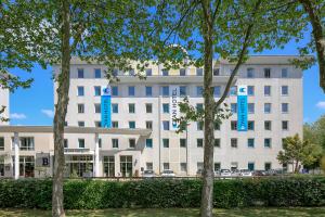 鲁瓦西昂法兰西CYAN HOTEL - Roissy Villepinte Parc des Expositions的相册照片