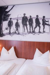 温特贝格度假村酒店客房内的一张或多张床位