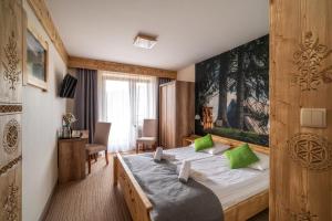 Hotel Eco Tatry Holiday& Spa客房内的一张或多张床位