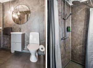 恩舍尔兹维克Nyrenoverat gårdshus på havstomt med hög standard的一间带卫生间和淋浴的浴室