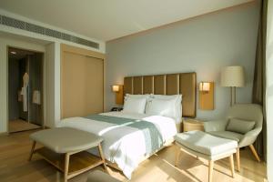 Zoya Health & Wellbeing Resort客房内的一张或多张床位