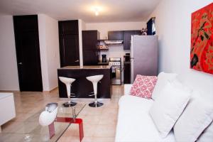 Apartment 409 Las Cañas - Sosúa的休息区