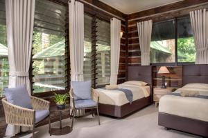 Rompin Rainforest Lodge客房内的一张或多张床位