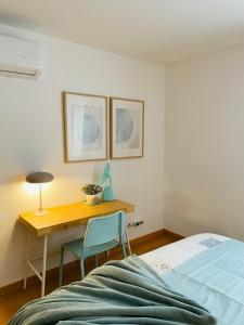 Fantástico apartamento T2 a 2min do acesso à praia CozyIn Cabanas客房内的一张或多张床位