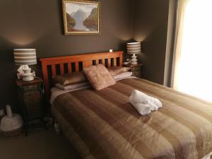 Lake Taupo Holiday Home客房内的一张或多张床位