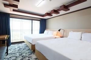 Sokcho Good Morning Hotel and Resort客房内的一张或多张床位