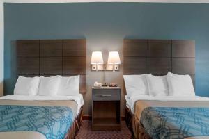 Americas Best Value Inn Gettysburg客房内的一张或多张床位