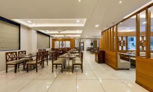 Hotel Grand Indu, 3 Star Kolhapur的休息区