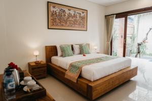 Tu Sandat Homestay客房内的一张或多张床位