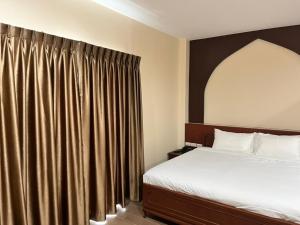Anwari Hotel客房内的一张或多张床位