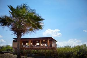 DibullaCorazon Guajiro Cabaña frente a Playa Solitaria en Dibulla cerca a Palomino - Cabin in front of Solitary Beachs的相册照片