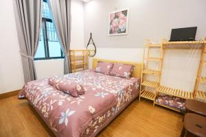 Kenpi Garden Homestay - NGUYÊN CĂN, đậu nhiều ô tô客房内的一张或多张床位