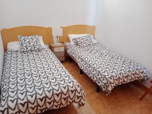 EL MORRO SEA VIEW APARTMENT客房内的一张或多张床位