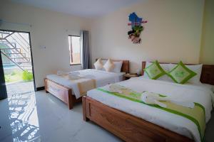 86 Homestay Phan Thiết客房内的一张或多张床位