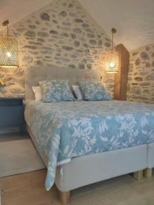 Le Secret du Moulin, agréable tiny house Villefort客房内的一张或多张床位
