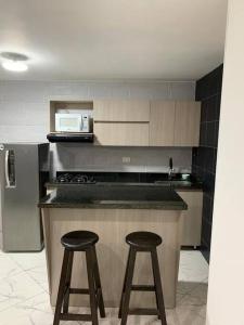 Apartamento cerca a Plaza Mayor en Medellín的厨房或小厨房