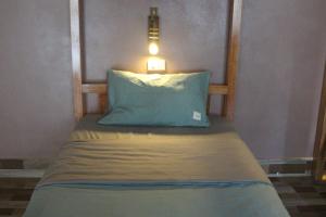 Ba Be Hostel客房内的一张或多张床位
