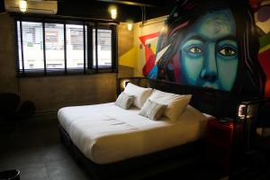 Hotel Sommelier LOFT客房内的一张或多张床位