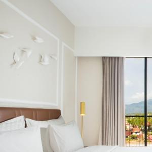 瑞士博里恩山口洋酒店客房内的一张或多张床位