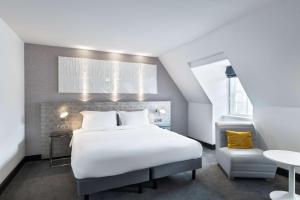 Radisson Blu Hotel, Edinburgh City Centre客房内的一张或多张床位