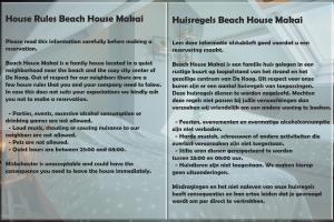 德科赫Beach House Makai - family house with Finnish Sauna, 2 bathrooms and only minutes from the Beach的房屋规则海滨房屋市场标志