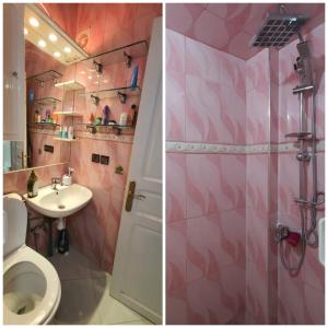 非斯Residence Bouanane B的粉红色的浴室设有卫生间和水槽