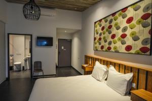 Cit'Hotel Le Relais du Boisniard客房内的一张或多张床位