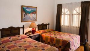 埃斯帕诺拉别墅酒店客房内的一张或多张床位