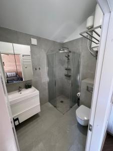 Apartamentai “Kuršių Snauda”的一间浴室